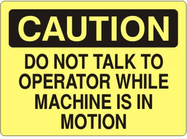 DO NOT TALK TO OPERATOR WHILE MACHINE IS IN MOTION - CAUTION SIGN