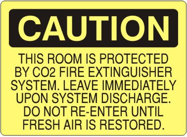 THIS ROOM IS PROTECTED BY CO2 FIRE EXTINGUISHER SYSTEM LEAVE - CAUTION SIGN