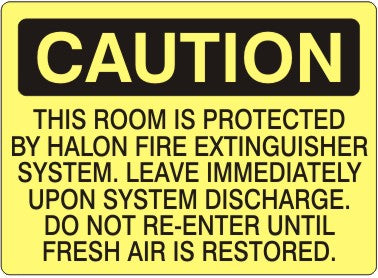 THIS ROOM IS PROTECTED BY HALON FIRE EXTINGUISHER SYSTEM. LEAVE - CAUTION SIGN