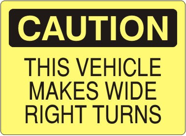 THIS VEHICLE MAKES WIDE RIGHT TURNS - CAUTION SIGN