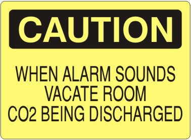WHEN ALARM SOUNDS VACATE ROOM CO2 BEING DISCHARGED - CAUTION SIGN