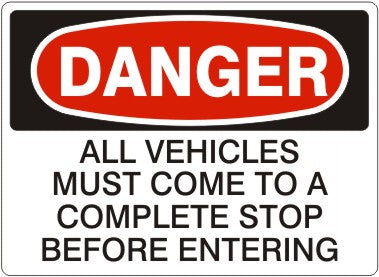 ALL VEHICLES MUST COME TO A COMPLETE STOP BEFORE ENTERING - DANGER SIGN