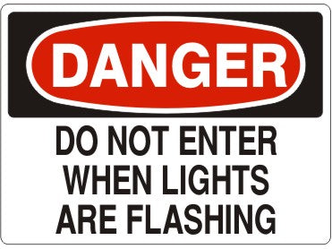 DO NOT ENTER WHEN LIGHTS ARE FLASHING - DANGER SIGN