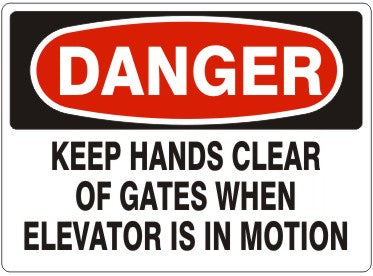 KEEP HANDS CLEAR OF GATES WHEN ELEVATOR IS IN MOTION - DANGER SIGN