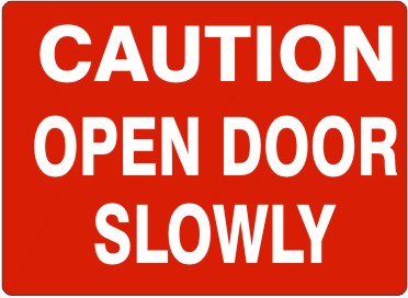 CAUTION OPEN DOOR SLOWLY