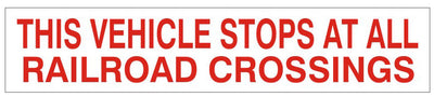 THIS VEHICLE STOPS AT ALL RAILROAD CROSSINGS